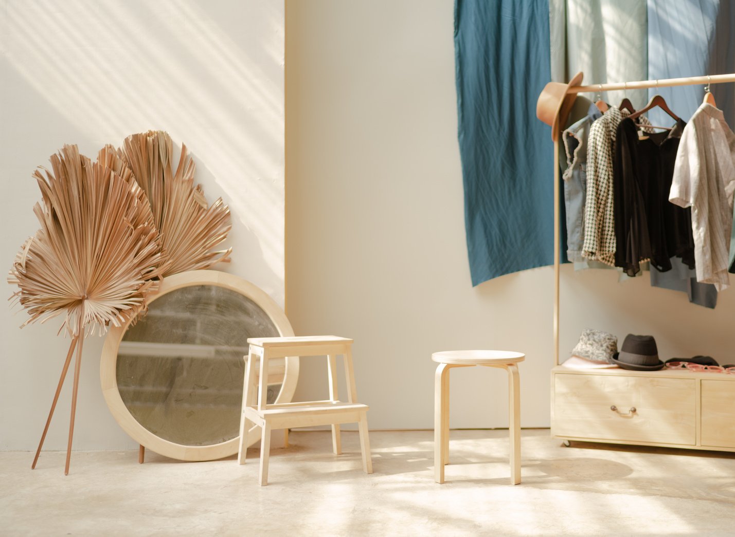 White Wooden Barstool and White Round White Mirror Frame